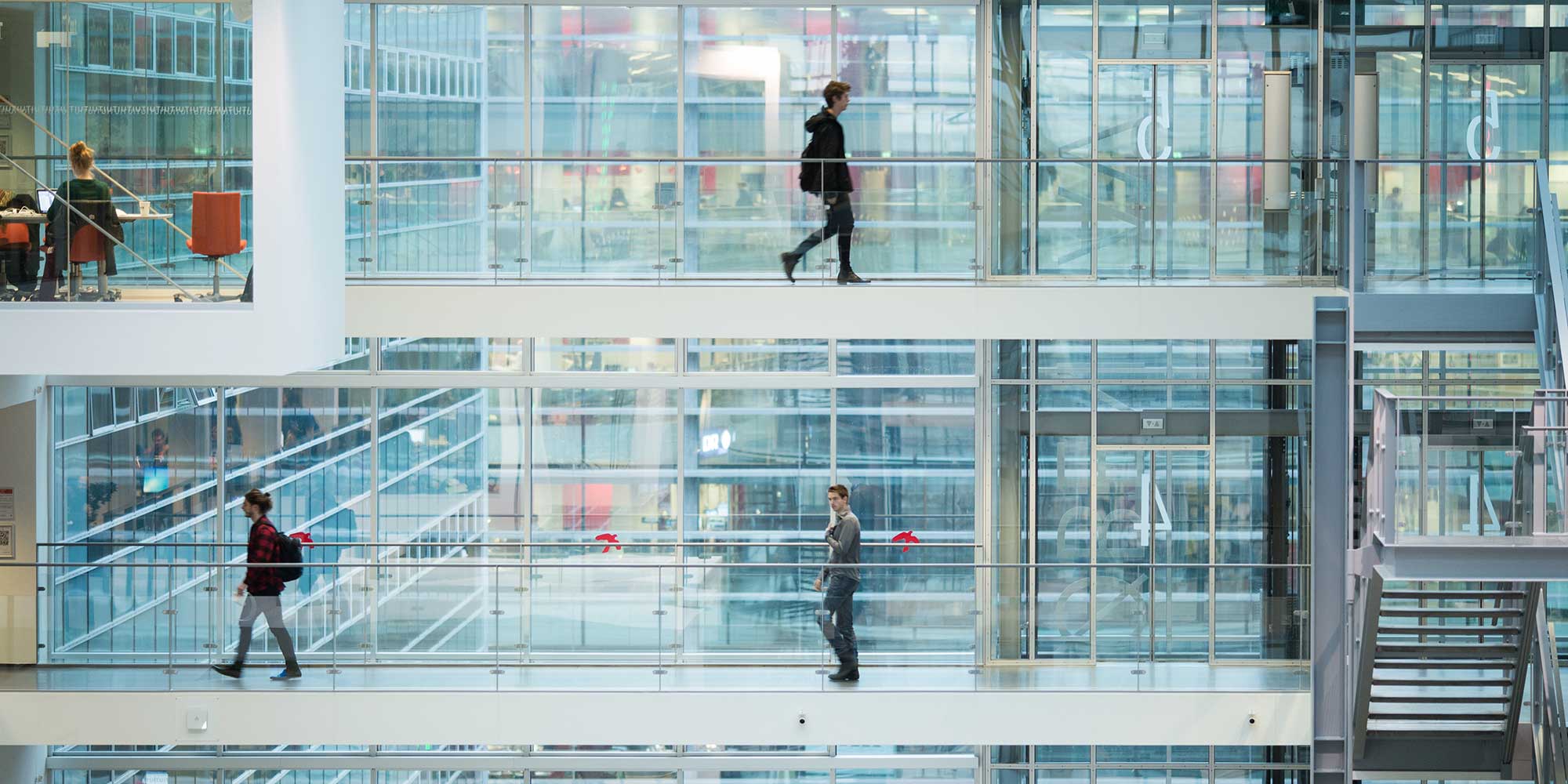 People on the broadwalk in atrium